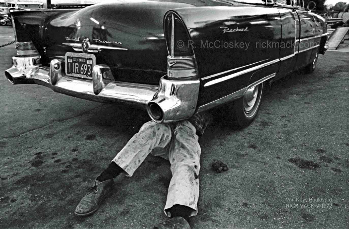 rick mccloskey; van nuys boulevard 1972; working on car; service; classic car; Packard; 1970s